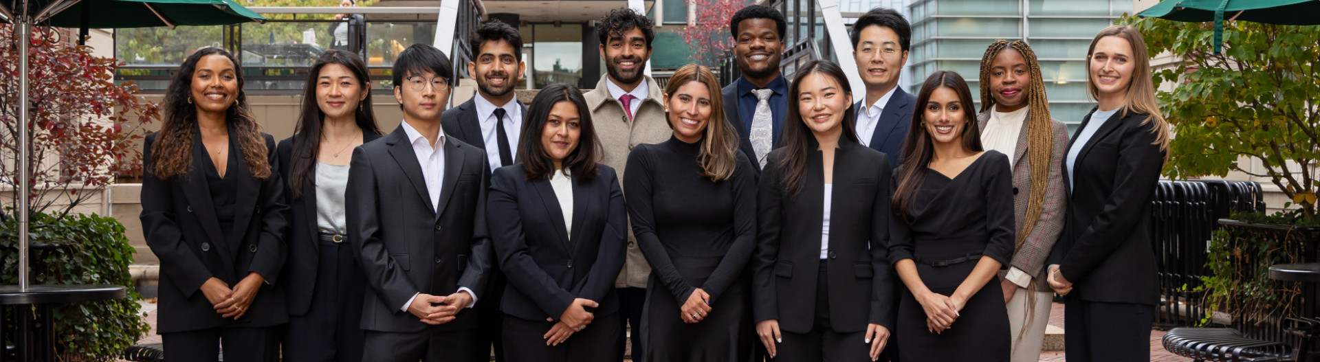 13 people standing together for a group shot. From left to right, Maria Eliana Perreira, Joanna Zhang, Jacob Lee, Azher Jaweed, Drishti Das, ZeSean Ali, Hannah Dimas, Samuel Nechi, Sarah Lee, Kuo Jiao, Neelam Sandhu, Sylvia Julius, Mackenzie Berwick